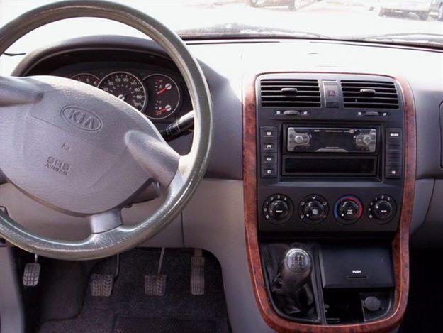 Kia Carnival II: 9 фото